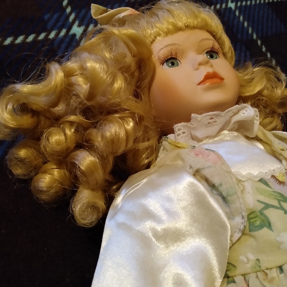 Porcelain doll by Seymour Mann